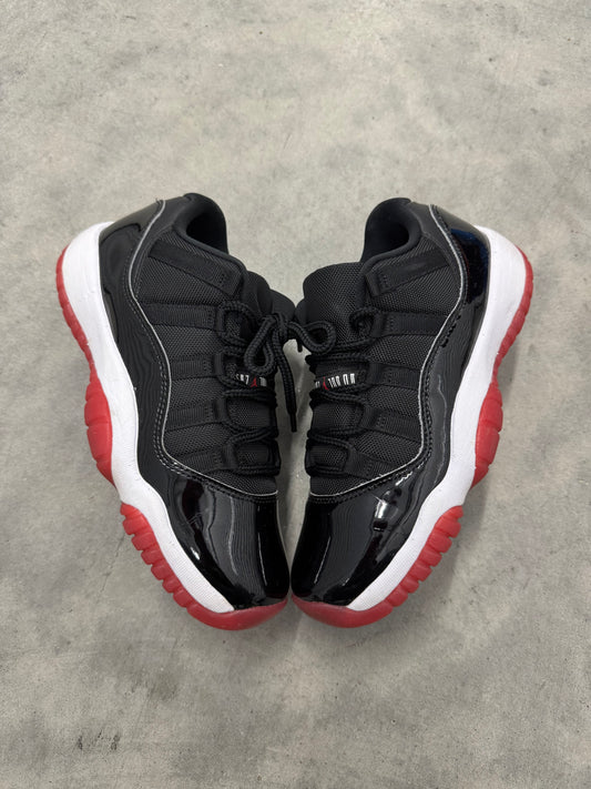 JORDAN 11 LOW “ Bred “