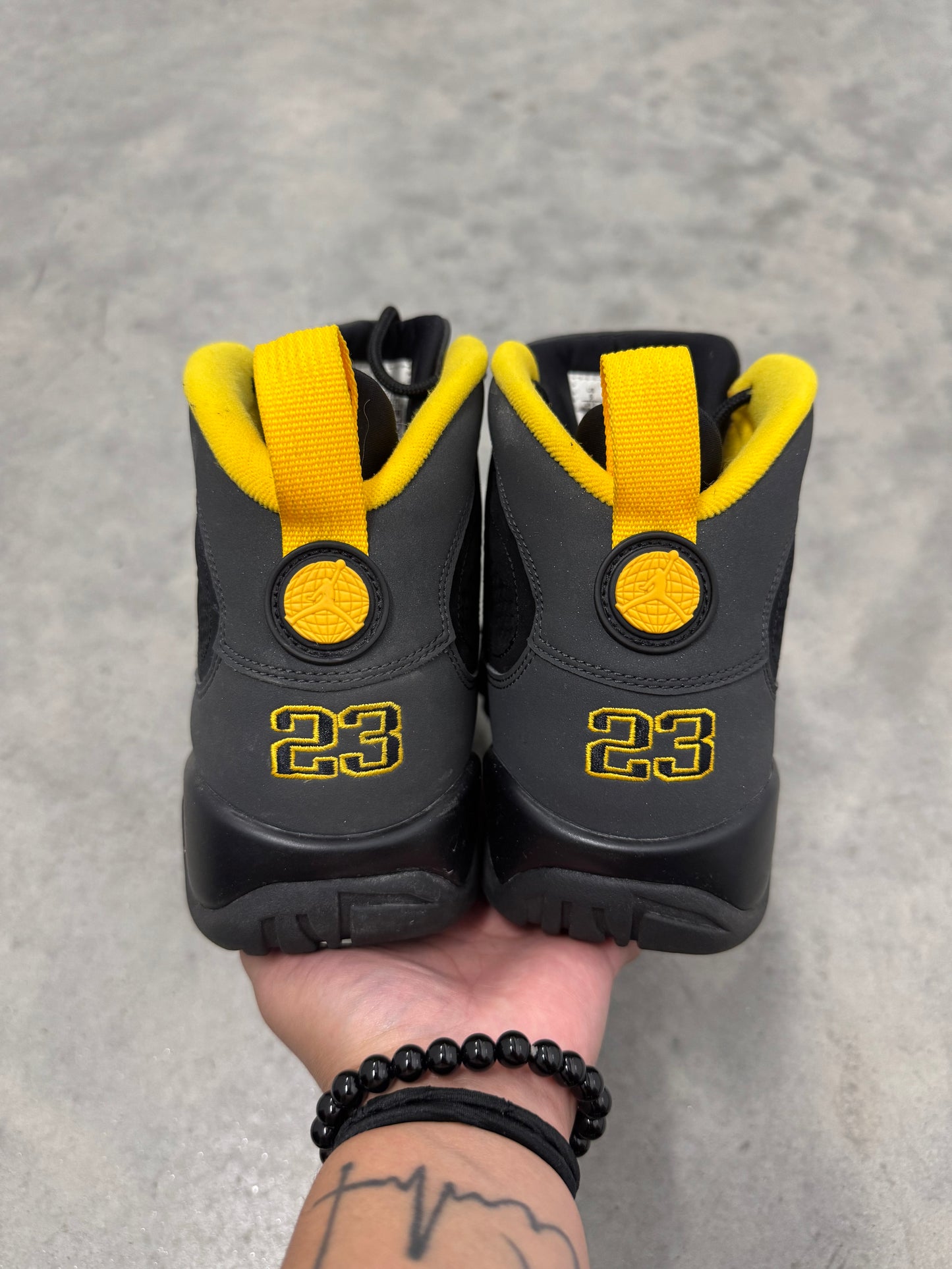JORDAN 9 “ Dark Charcoal University Gold “
